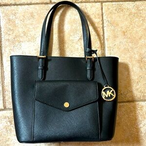 New Michael Kors handbag. No tags but in pristine condition.